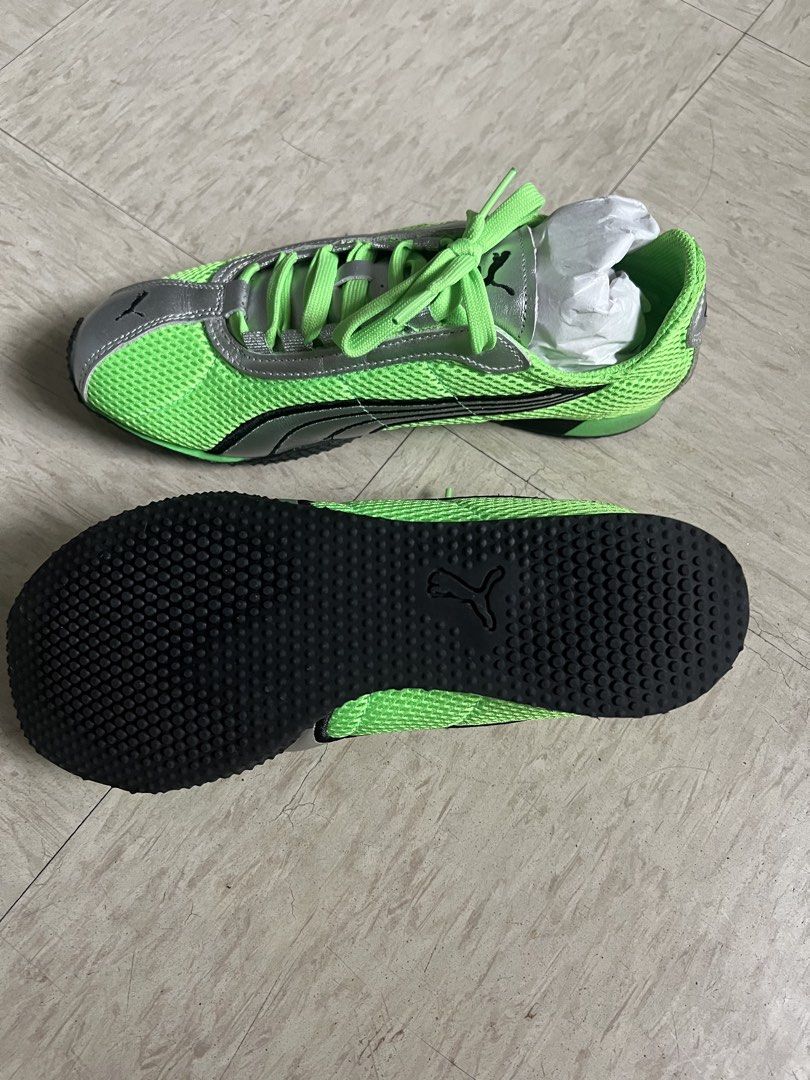Puma Lime Green Silver Speedcat Sneakers (Category: Sneakers) located in Quezon City. Submitted by Zandee (Listing ID 1469270208, Image 2). Description: - Brand: Puma - Color: Bright lime green and silver - Size: US 7.5, UK 6.5, EUR 40 (25.5 cm) - Material: Breathable mesh upper with iconic formstrip branding - Sole: Low profile with rubber grip dot pattern.