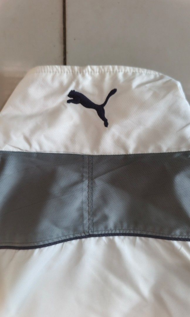 Puma track jacket windbreaker (Category: Coats, Jackets and Outerwear) located in Zamboanga. Submitted by crazy_findss (Listing ID 1469315638, Image 3). Description: 24x26 dimes Size Medium to large Great condition Minimal issue(visible on the last 3 pictures) Working zippers Add sf Location:Zamboanga City.