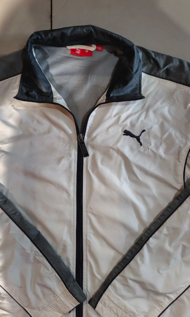 Puma track jacket windbreaker (Category: Coats, Jackets and Outerwear) located in Zamboanga. Submitted by crazy_findss (Listing ID 1469315638, Image 2). Description: 24x26 dimes Size Medium to large Great condition Minimal issue(visible on the last 3 pictures) Working zippers Add sf Location:Zamboanga City.