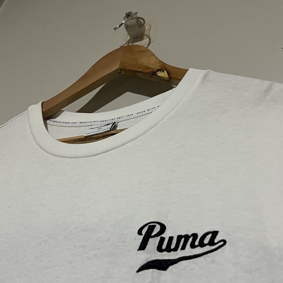 Puma White Black Colorblock Tee Shirt (Category: Formal Shirts) located in Argao. Submitted by secondcyclecollection (Listing ID 1469293908, Image 3). Description: - Brand: Puma - Color: White with striking black colorblock panel and back band - Details: Embroidered script Puma logo, Puma Team label near lower hem, branded inner neck taping - Size: Asia S on Tag Fit Largw To XL - Condition: Brand new / Excellent - Mode of Payment: GCash, BPI, or 