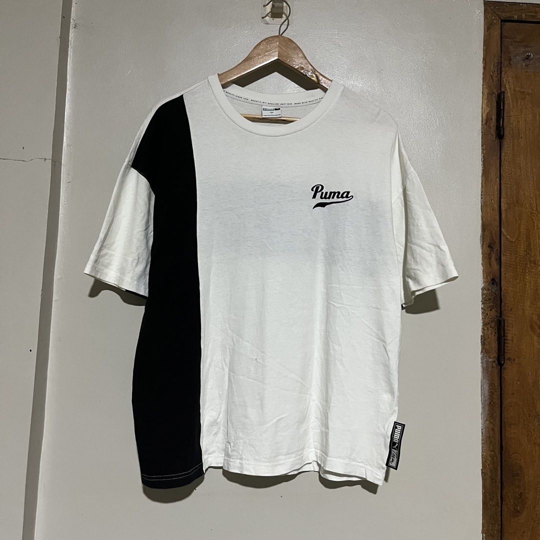 Puma White Black Colorblock Tee Shirt (Category: Formal Shirts) located in Argao. Submitted by secondcyclecollection (Listing ID 1469293908, Image 2). Description: - Brand: Puma - Color: White with striking black colorblock panel and back band - Details: Embroidered script Puma logo, Puma Team label near lower hem, branded inner neck taping - Size: Asia S on Tag Fit Largw To XL - Condition: Brand new / Excellent - Mode of Payment: GCash, BPI, or 