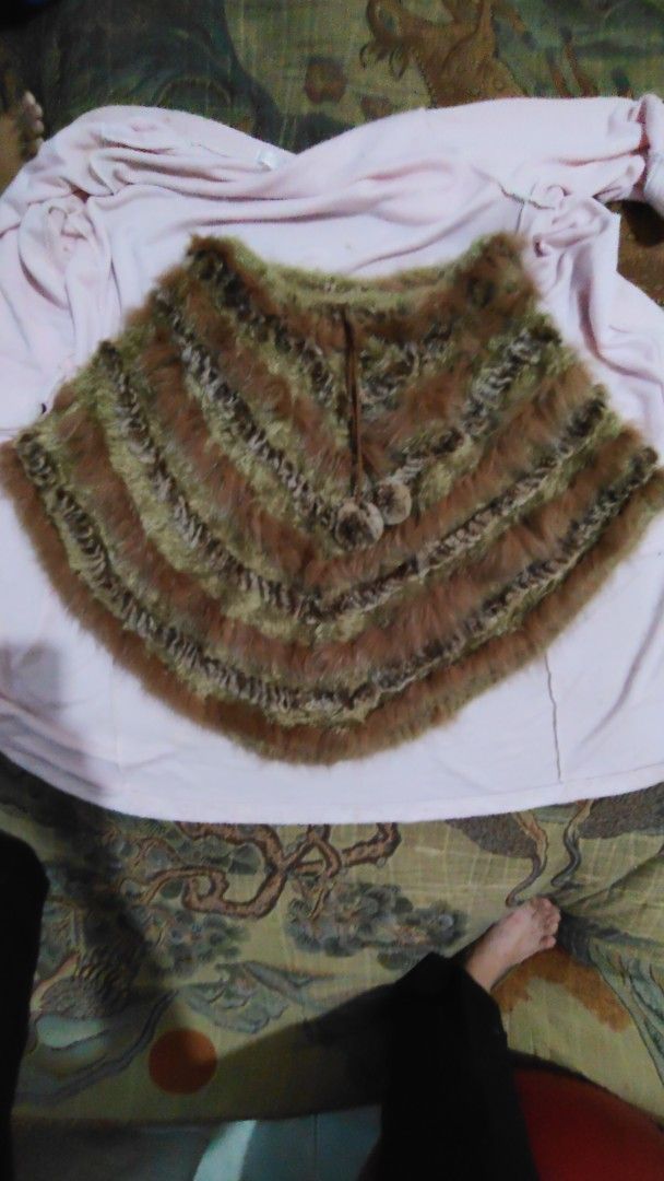 Pwede balabal...pwede skirt... (Category: Coats, Jackets and Outerwear) located in Cebu City. Submitted by lumaynojes00490 (Listing ID 1469258670, Image 2). Description: - Brown and green striped faux fur poncho - Soft textured stripes for a stylish layered look - Drawstring neckline with cute fluffy pom pom ties - Warm and cozy winter accessory.