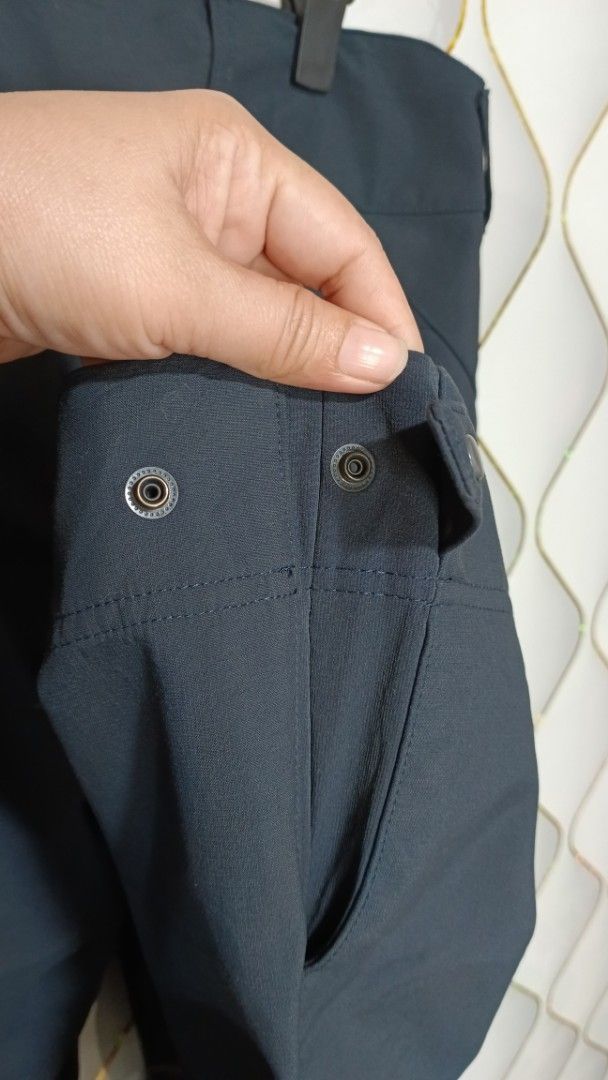 Quechua Hiking Pants Dark Grey (Category: Activewear) located in Manila. Submitted by zariyah.1986 (Listing ID 1469175077, Image 3). Description: - Brand: Quechua - Color: Dark grey - Size: 33-34 - Features: Button closure, belt loops, and adjustable snap buttons at the ankle cuffs - Material: Sturdy, durable fabric built for the outdoors - Best for: Hiking, camping, trails, and outdoor activities.