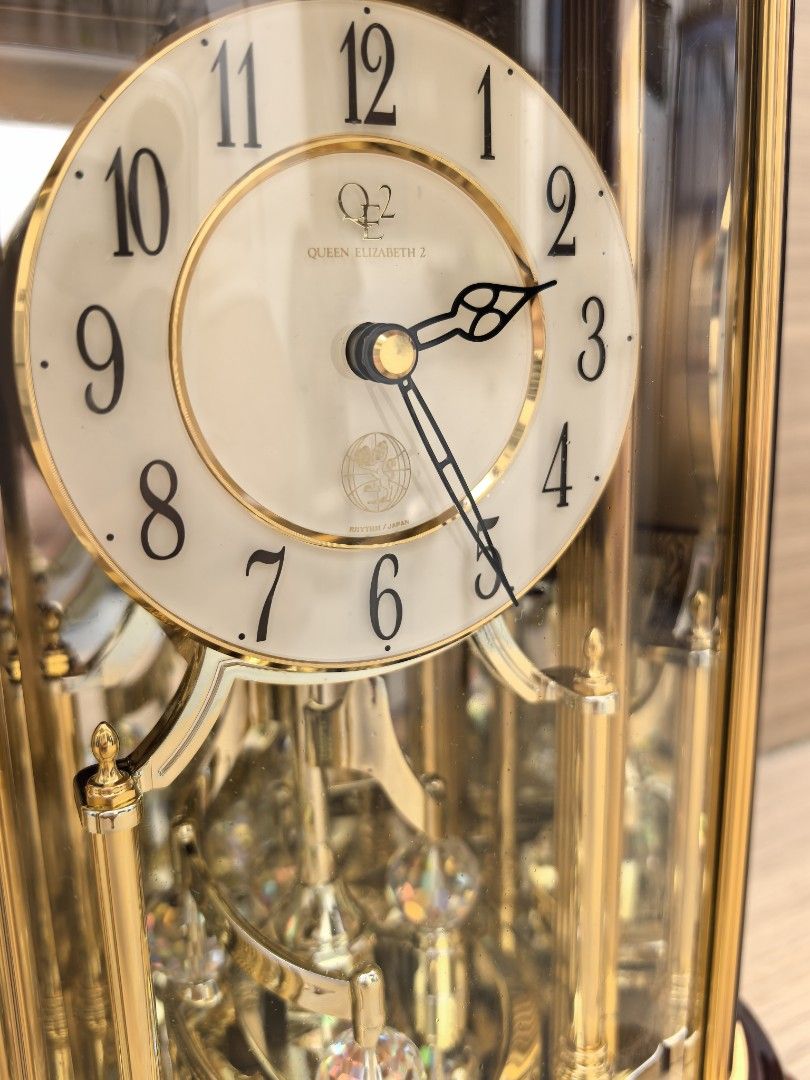 QUEEN ELIZABETH II QE2 RHYTHM TABLE CLOCK (Category: Clocks) located in Quezon City. Submitted by vintagespektroom (Listing ID 1469312553, Image 2). Description: 🕰️ FOR SALE: QUEEN ELIZABETH II QE2 RHYTHM TABLE CLOCK 🇮🇹 ✨ Elegant • Classic • Collectible ✨ For sale Queen Elizabeth II QE2 Rhythm Table Clock, made in Italy. Featuring a luxurious green inlaid finish, this sophisticated timepiece is perfect for collectors, clock enthusiasts. 💎 Det