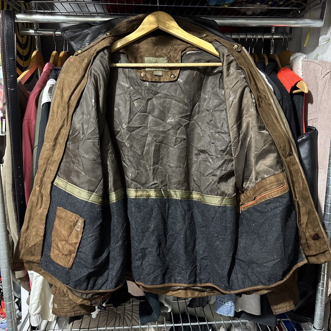 Rainforest Brown Jacket with Leather Collar (Category: Coats, Jackets and Outerwear) located in Caloocan City. Submitted by bonsatocha43876 (Listing ID 1469322503, Image 2). Description: - Color/Style: Brown Rainforest jacket with a contrast black leather collar - Closure: Full zip front with a secure button flap - Pockets: Big front pockets plus extra interior pockets - Lining: Stylish patterned inside lining - Dimensions: Width 24 inches, Lengt
