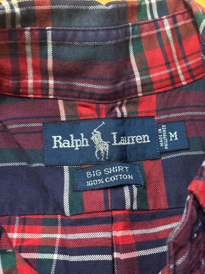 Ralph Lauren Big Shirt Plaid Button-Down (Category: Tshirts & Polo Shirts ) located in Paranaque City. Submitted by poego (Listing ID 1469271375, Image 2). Description: - Brand: Ralph Lauren - Design: Classic plaid in navy blue, red, and green - Material: 100% breathable cotton (Made in the Philippines) - Size: Medium (Regular fit) - Features: Button front, classic collar, chest pocket, and long sleeves - Condition: Excellent, no flaws.