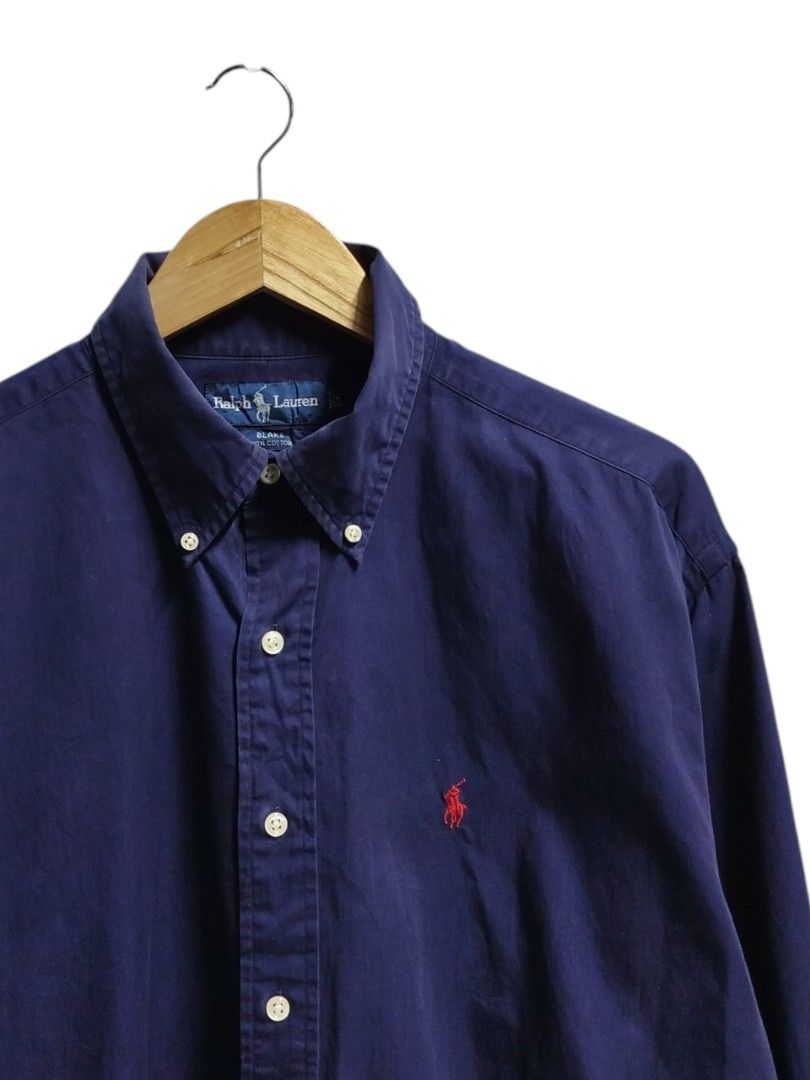 RALPH LAUREN BUTTON DOWN LONGSLEEVE POLO (Category: Formal Shirts) located in Bayombong. Submitted by Gentlemans_ClosEt (Listing ID 1469304207, Image 2). Description: RALPH LAUREN BUTTON DOWN LONGSLEEVE POLO SIZE LARGE ON TAG CAN FIT UPTO SIZE XL DIMES: W25 X L29 BACK L31 COLOR: NAVY BLUE 9/10 COLOR RATE ISSUE: MINOR COLLAR LINE FADING.