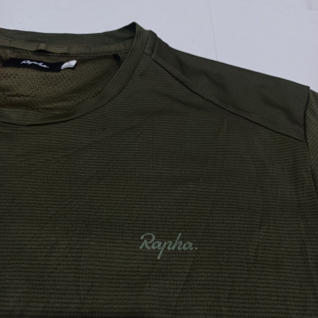 Rapha Technical Cycling T-Shirt Olive Green Size L (Category: Tshirts & Polo Shirts ) located in Davao. Submitted by zion_thrift.PH (Listing ID 1469175803, Image 3). Description: RAPHA technical t-shirt Size Large 21 x 27.5 dimes Excellent condition 9.9/10 color rate 📌Price 850 Davao city location - Brand: Rapha - Color: Dark Olive Green - Size: L (Tag at collar) - Origin: Made in Vietnam - Material: Textured technical fabric with reinforced sid