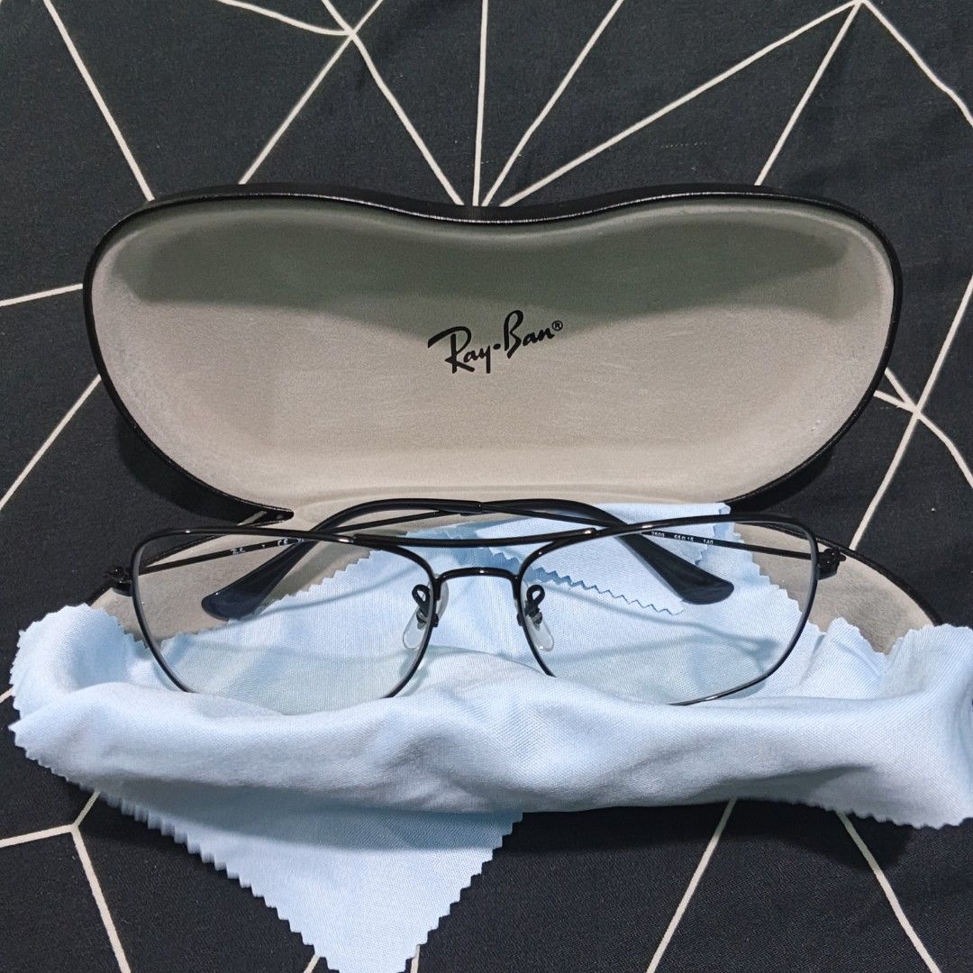 Ray-Ban RB 6498 Aviator Eyeglasses Black Frame (Category: Sunglasses & Eyewear) located in Manila. Submitted by xvx02 (Listing ID 1469266088, Image 2). Description: - Authentic Ray-Ban RB 6498 optical frames (Model: RB 6498 2509 55-15) - Classic double bridge pilot shape in sleek black - Size: Lens 55, Bridge 15, Temple 140 - Flawless condition: Zero scratches on frame and lenses - Includes original Ray-Ban hard leather case and light blue microf