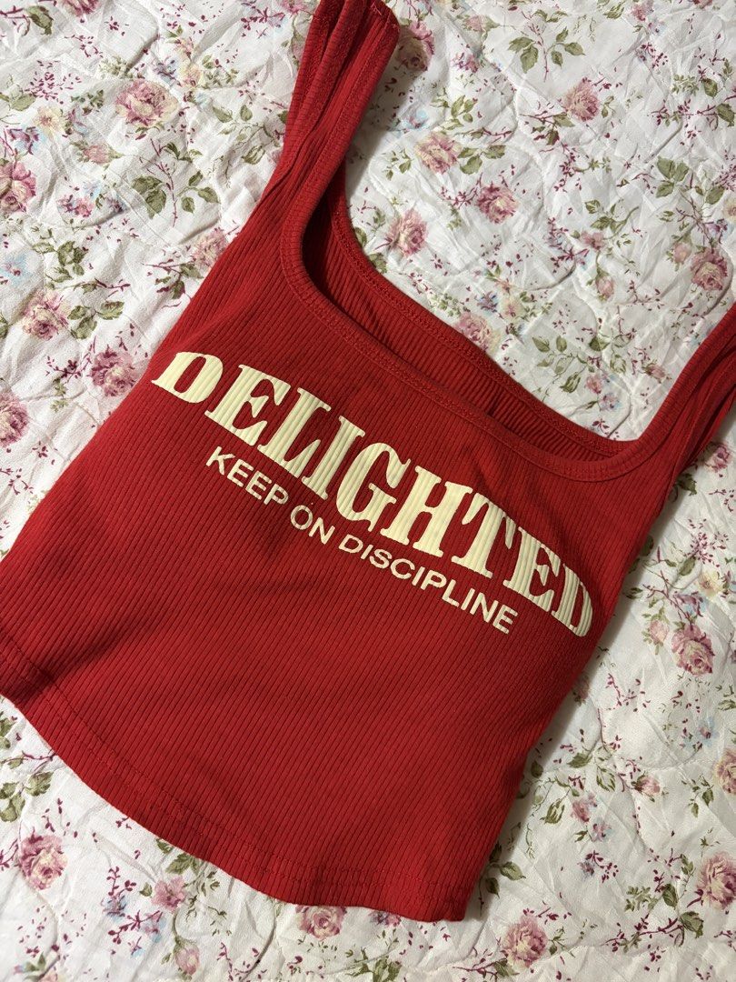 Red Graphic Tank Top (Category: Sleeveless) located in Muntinlupa City. Submitted by herellas0504 (Listing ID 1469302965, Image 2). Description: Red Graphic Tank Top Mine: 280 | Lock: 380 ———————————— size: xs-med no issue, good as new! padded willing to keep!.