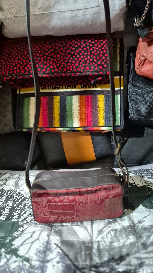 Red patterned patchwork and dark leather crossbody bag (Category: Cross-body Bags) located in Manila. Submitted by ertya (Listing ID 1469380897, Image 3). Description: no rubs good condition.