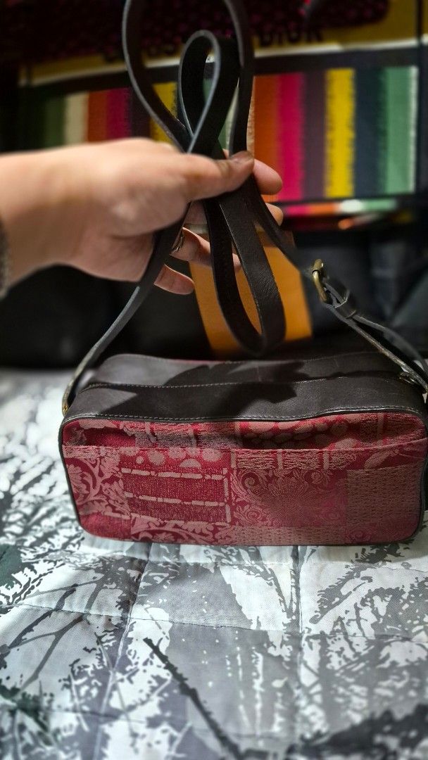 Red patterned patchwork and dark leather crossbody bag (Category: Cross-body Bags) located in Manila. Submitted by ertya (Listing ID 1469380897, Image 1). Description: no rubs good condition.