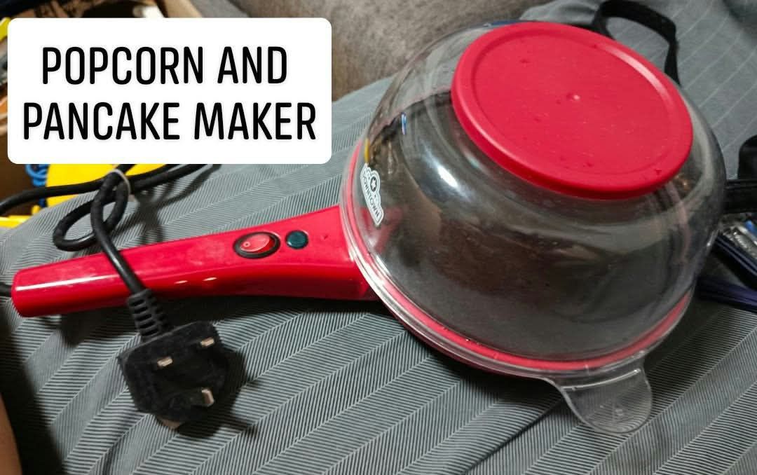 Red Popcorn and Pancake Maker Electric Appliance (Category: Cookware & Accessories) located in Quezon City. Submitted by robelles_thriftshop (Listing ID 1469372913, Image 1). Description: - Vibrant red multi-functional appliance for popcorn and pancakes - Easy-to-clean non-stick heating surface - Clear dome lid to watch the cooking process - Convenient on/off switch located right on the handle - Equipped with a UK 3-pin plug - Ideal for fun movie