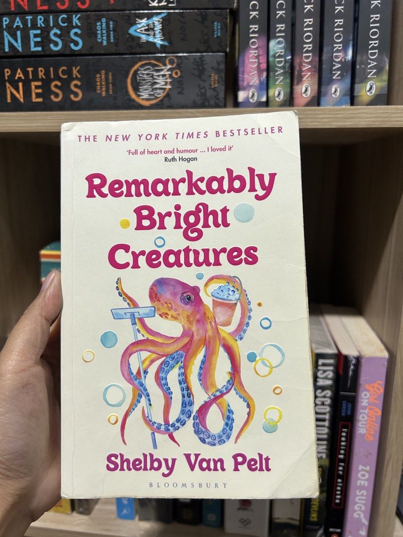 Remarkably Bright Creatures by Shelby Van Pelt paperback book (Category: Storybooks) located in Manila. Submitted by meannt. (Listing ID 1469316536, Image 1). Description: - Title: Remarkably Bright Creatures - Author: Shelby Van Pelt - Publisher: Bloomsbury - Format: Paperback - Highlights: New York Times bestseller with praise quote on the cover and a beautiful colorful octopus illustration - Perfect for: Fiction fans and cozy readers .
