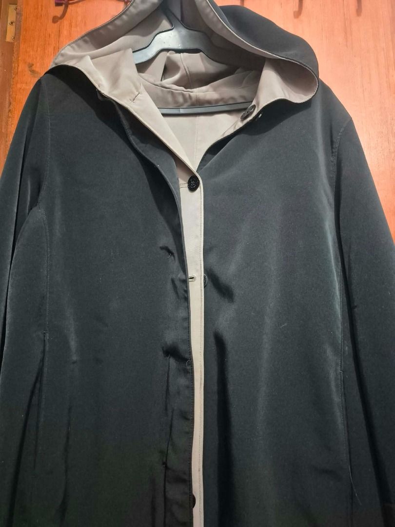Reversible Black and Beige Hooded Jacket (Category: Coats, Jackets and Outerwear) located in Pasig City. Submitted by kathee88 (Listing ID 1469190326, Image 3). Description: - Color: Black and beige - Design: Reversible two-tone style - Closure: Button front with large dark buttons - Hood: Attached with contrasting lining - Sleeves: Long with stitched cuffs - Fit: Perfect for easy everyday casual wear Price: Negotiable RFS: Decluttering Location: