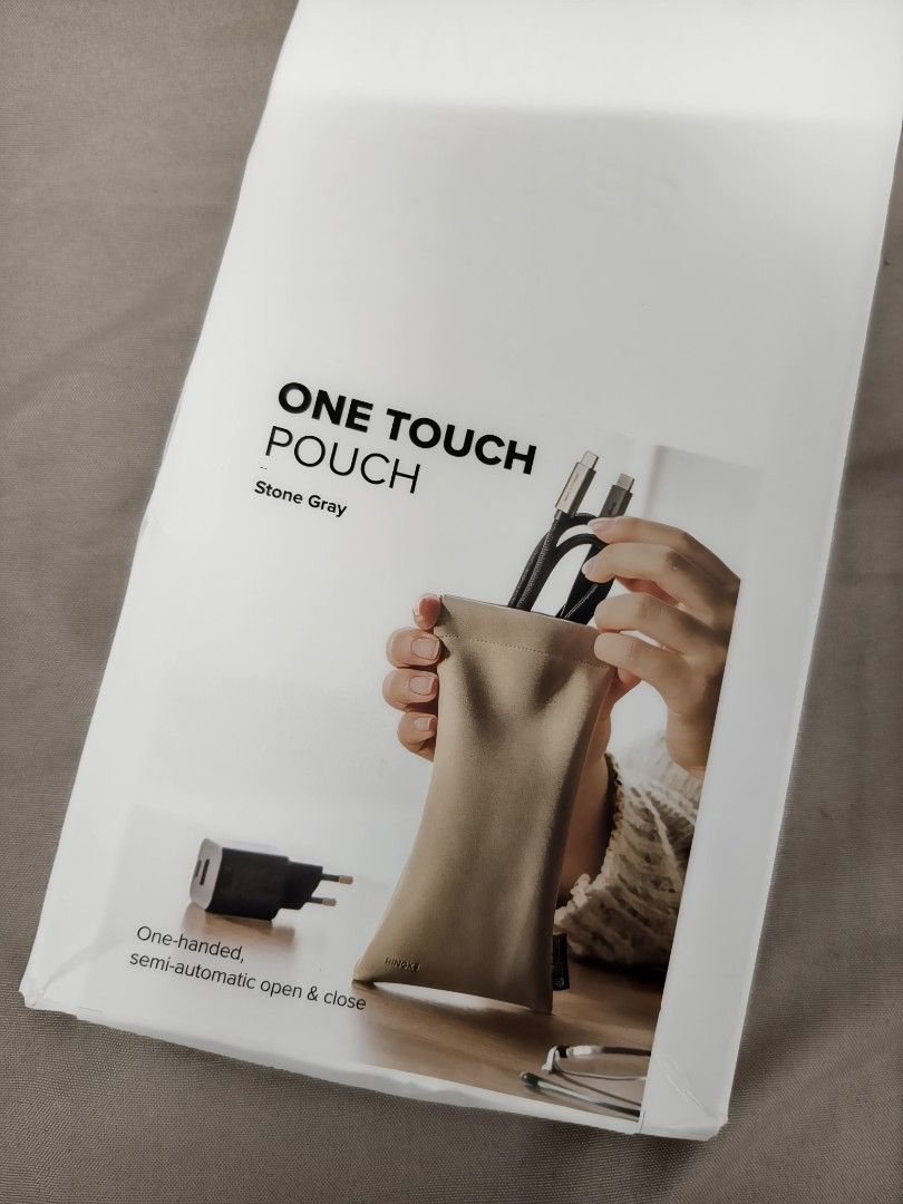 RINGKE ONE TOUCH POUCH (Category: Other Mobile & Gadget Accessories) located in Angeles City. Submitted by measaliman02351 (Listing ID 1469166143, Image 2). Description: - Brand: Ringke - Product: One Touch Pouch - Color: Stone Gray - Size: 90 x 180 mm - Material: 100% Polyurethane (PU) - Features: One-handed, semi-automatic open & close mechanism - Ideal Use: Organizing charging cables and small tech essentials - Condition: Brand new in original