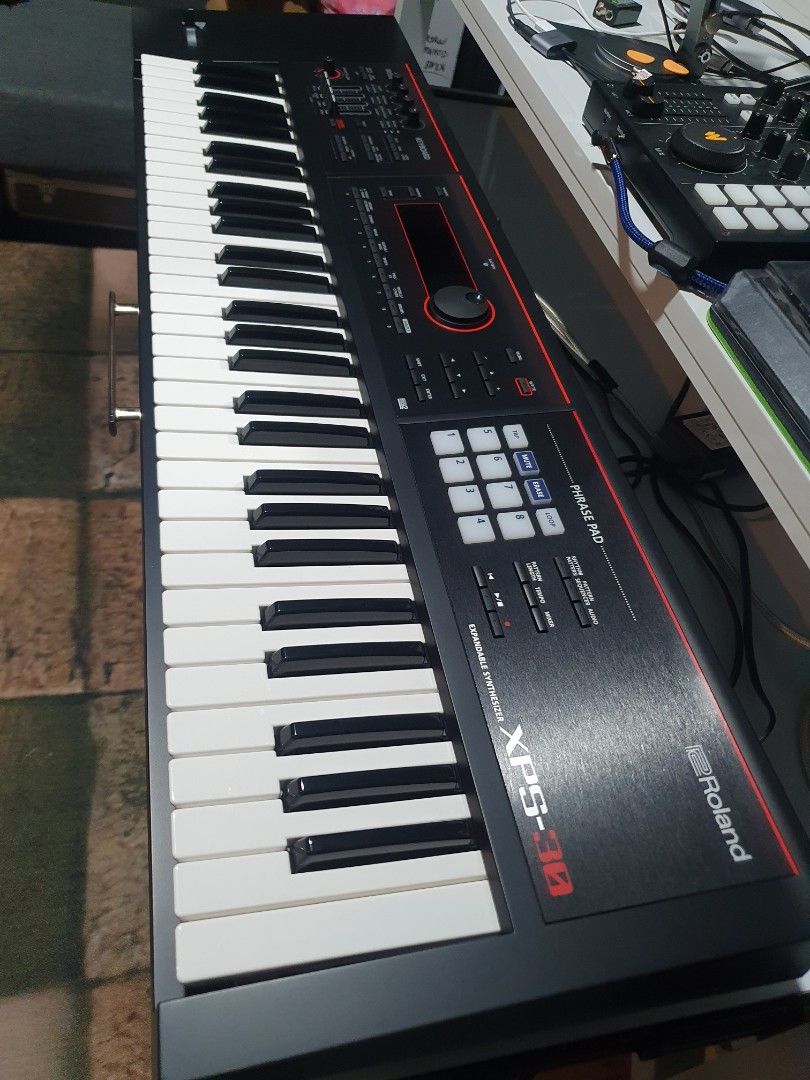 Roland XPS-30 Expandable Synthesizer Keyboard (Category: Musical Instruments) located in Guiguinto. Submitted by smyle1128 (Listing ID 1469333145, Image 2). Description: Keyboard Roland Xps 30 with new gig bag!!! fresh na fresh Roland xps 30 simula ng binili nasa bahay lang.. Never na gig, sa bahay lang hindi naibyahe or kahit ano pa bagong bago lang nito,.. Makinis na makinis.. With gig bag na customize. Para safe yung bender.. Pm sa interesado 