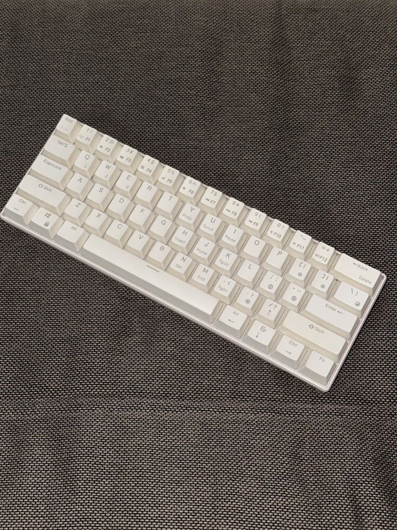 Royal Kludge RK White Mechanical Keyboard (Category: Computer Keyboard) located in Mandaluyong City. Submitted by bobtteok (Listing ID 1469299543, Image 2). Description: - Model: Royal Kludge (RK) 60% Mechanical Keyboard - Color: Clean all-white frame with matching white keycaps and stylish sub-legends - Connectivity: Wired and wireless options available - Performance: Snappy, tactile, and ultra-responsive typing experience - Design: Compact spac