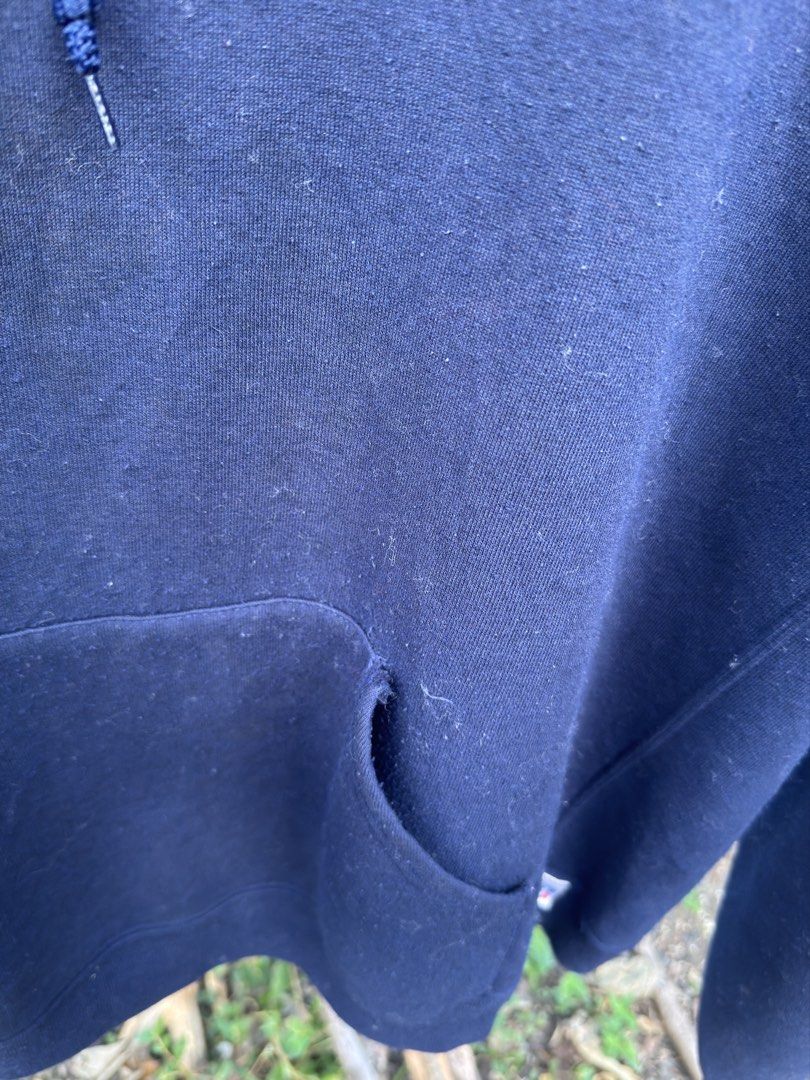 Russell Athletic Navy Blue Hoodie (Category: Coats, Jackets and Outerwear) located in Batangas. Submitted by Treasure.vtg (Listing ID 1469239967, Image 2). Description: - Brand/Model: Russell Athletic Hoodie - Color: Navy Blue - Size: XXL - Material: 50% cotton, 50% polyester (Made in Honduras) - Features: Thick fabric, soft interior lining, front kangaroo pocket, adjustable drawstring hood - Fit: Regular fit, perfect as an everyday basic.