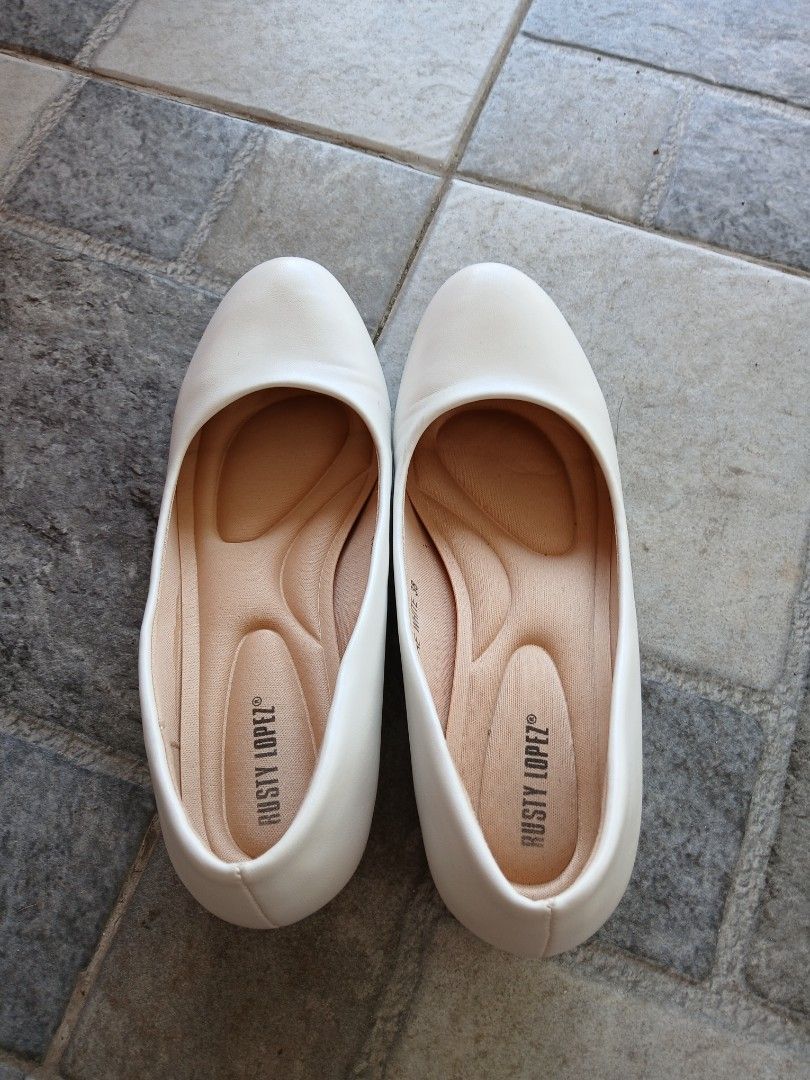 Rusty Lopez Fae White Low Block Heels Size 38 (Category: Heels) located in Bacoor. Submitted by rm_sells (Listing ID 1469181121, Image 3). Description: - Nursing Shoes - Brand: Rusty Lopez (Model: Fae White) - Size: 38 - Color: White - Condition: Barely worn, practically pristine - Comfort: Cushioned insoles for added support - Inclusion: Original blue box - Versatility: Great neutral pair for work or special events.