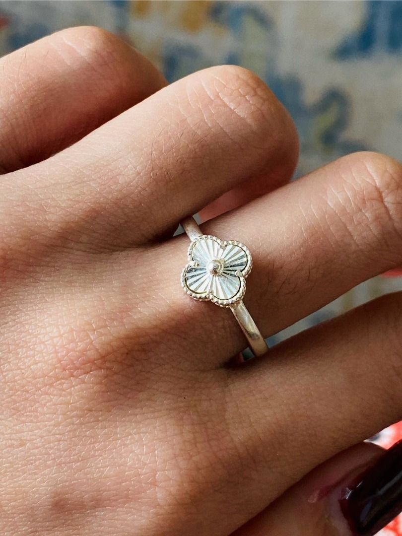 S6.75 Vintage VCA insp Clover Silver Ring (Category: Rings) located in Baguio. Submitted by asna_taku (Listing ID 1469262682, Image 1). Description: 🤍✨ Vintage VC@ insp Clover Silver Ring 🌸 Elegant, timeless, and effortlessly sophisticated! This beautiful vintage-inspired ring features a delicate four-petal clover motif with a luminous, mother-of-pearl-style finish and intricate beaded edging. Paired with a sleek silver band, its minimalist des