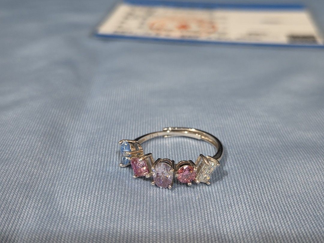 S925 Silver Multi-Color Gemstone Adjustable Ring (Category: Rings) located in Manila. Submitted by fayiefar (Listing ID 1469282675, Image 3). Description: - Material: S925 Sterling Silver - Design: Multi-color gemstones in teardrop, square, oval, round, and baguette cuts - Colors: Beautiful pink, light blue, white and lavander - Fit: Adjustable band - Condition: Brand new - Inclusions: Comes with authenticity certification card.