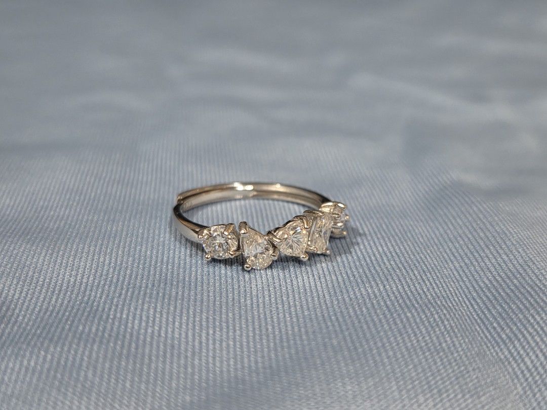 S925 Silver multi-shape moissanite stone ring (Category: Rings) located in Manila. Submitted by fayiefar (Listing ID 1469290341, Image 2). Description: - Design: Silver ring with 5 multi-cut moissanite stones (round, pear, heart, rectangular,oval) - Fit: Adjustable band - Condition: Brand new - with S925 stamp - Inclusions: Comes with authenticity certification card .