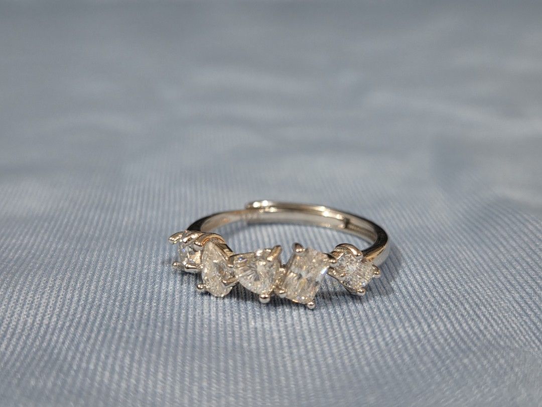 S925 Silver multi-shape moissanite stone ring (Category: Rings) located in Manila. Submitted by fayiefar (Listing ID 1469290341, Image 3). Description: - Design: Silver ring with 5 multi-cut moissanite stones (round, pear, heart, rectangular,oval) - Fit: Adjustable band - Condition: Brand new - with S925 stamp - Inclusions: Comes with authenticity certification card .