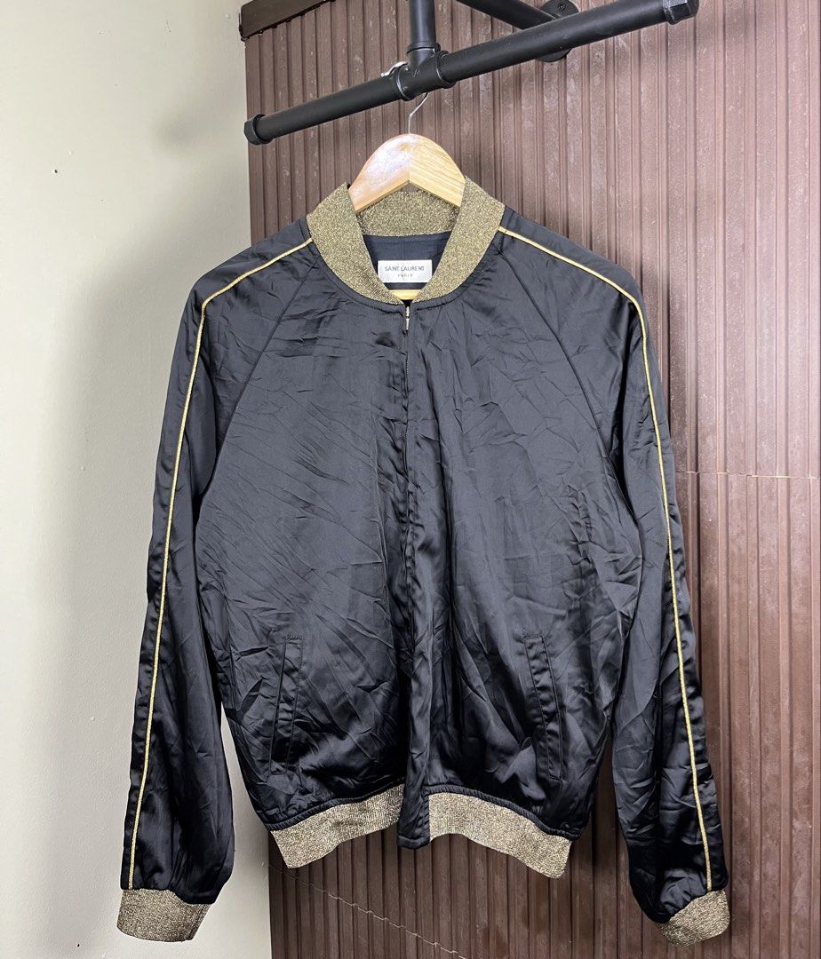 Saint Laurent Paris - Hedi Slimane SS/15 Bomber Jacket (Category: Coats, Jackets and Outerwear) located in Cabanatuan. Submitted by cabsygoods (Listing ID 1469189812, Image 1). Description: Saint Laurent Paris - Hedi Slimane SS/15 Bomber Jacket Width: 21 Length: 25 (Inches) Very good condition No issue Color rate 9/10 Dm to purchase! 📩.