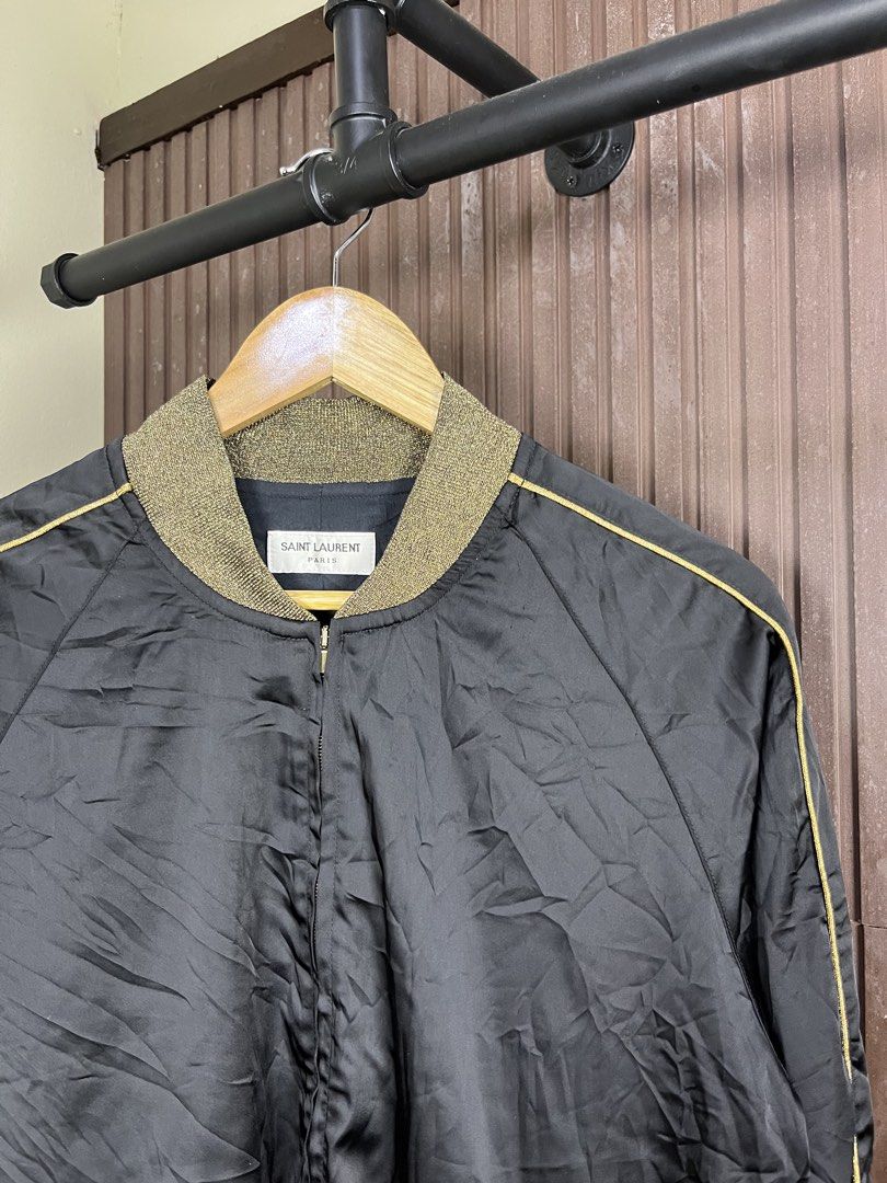 Saint Laurent Paris - Hedi Slimane SS/15 Bomber Jacket (Category: Coats, Jackets and Outerwear) located in Cabanatuan. Submitted by cabsygoods (Listing ID 1469189812, Image 2). Description: Saint Laurent Paris - Hedi Slimane SS/15 Bomber Jacket Width: 21 Length: 25 (Inches) Very good condition No issue Color rate 9/10 Dm to purchase! 📩.