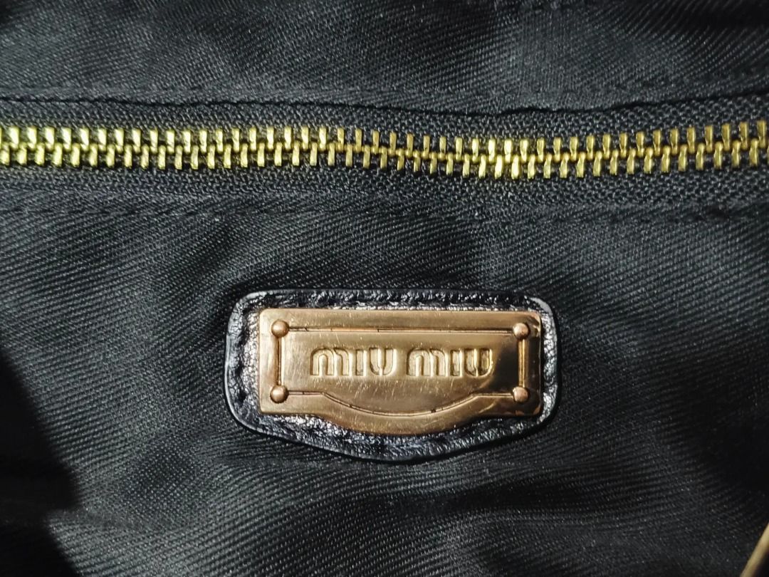 Sale! Miu miu (Category: Shoulder Bags) located in Cabuyao City. Submitted by your____lux____shop (Listing ID 1469180013, Image 3). Description: Sale❗️Sale❗️Sale❗️ ₱ 1,699 Miu Miu PROJECT BAG Black Medium Lampo under zip BAWAL SA MASELAN 📌First to pay!.