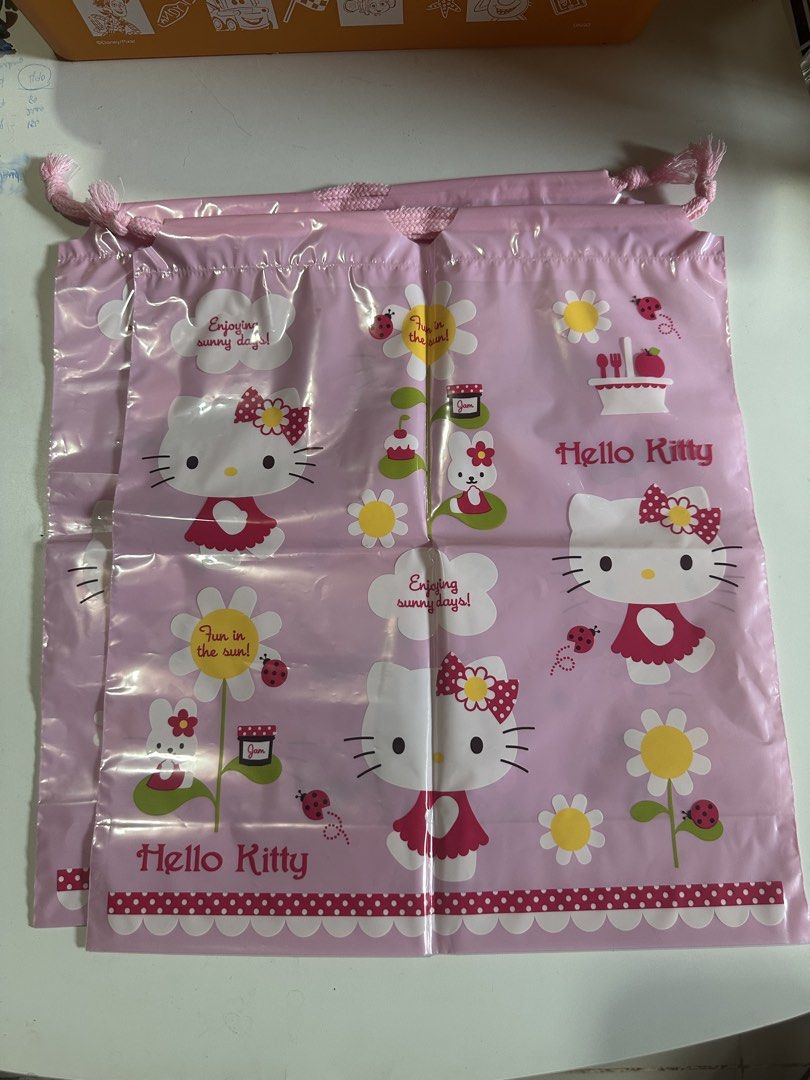 Sanrio Hello Kitty Drawstring Pouch - 2pcs (Category: Character Goods) located in Davao. Submitted by favoritepreloved (Listing ID 1469228150, Image 1). Description: 💜 Size: 34cm height x 30cm 💜 Multipurpose storage bag.
