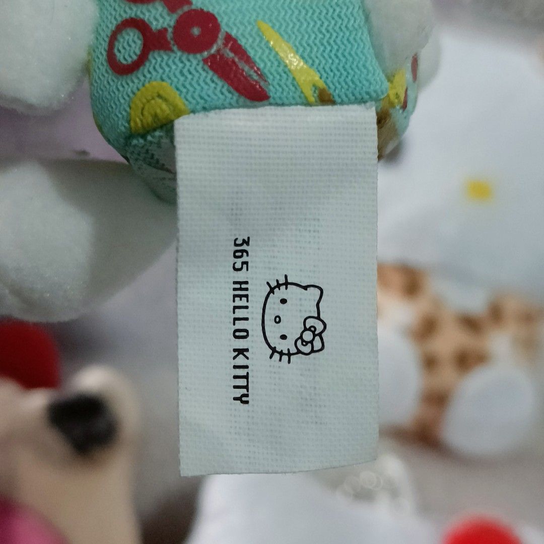 Sanrio Hello Kitty Small Plush Keychain Assortment Set (Category: Plushies & Soft Toys) located in Baguio. Submitted by baileybails (Listing ID 1469199968, Image 2). Description: - Authentic Sanrio 2025 Kitty plush keychains (Set of 4) - Variety of cute outfits: leopard print, school uniform, animal hoodie, and patterned dress - Equipped with metal ball chains or strings for easy hanging - Tags attached on select pieces - Made with super soft, of