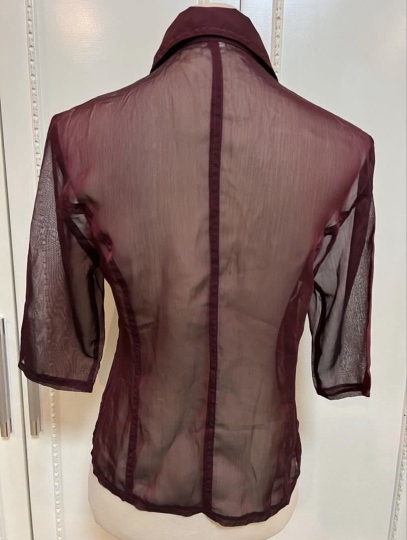 See-thru Maroon Sheer Button Down Shirt Size M (Category: Blouses) located in Quezon City. Submitted by letsdeclutter101 (Listing ID 1469380261, Image 2). Description: - Brand/Label: Couture - Size: Medium (tag on collar) - Color: Maroon - Material: Lightweight sheer mesh with slight see-through finish - Design: Classic collared neckline, front button placket, and half sleeves - Detail: Solid fabric panel running down the collar and button line.