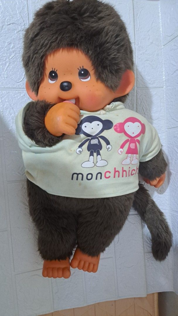 Sekiguchi Monchhichi Plush Doll with Outfit (Category: Plushies & Soft Toys) located in Quezon City. Submitted by hersheejubilo (Listing ID 1469304882, Image 1). Description: -[AUTHENTIC / ORIGINAL] Sekiguchi Monchhichi Premium Standard Jumbo 2L Size Boy with Official Graphic Hoodie Letting go of this highly collectible, massive Jumbo 2L Monchhichi Boy plush doll. This is the premium "baby-sized" variant—extremely chunky, heavy, and incredibly hu