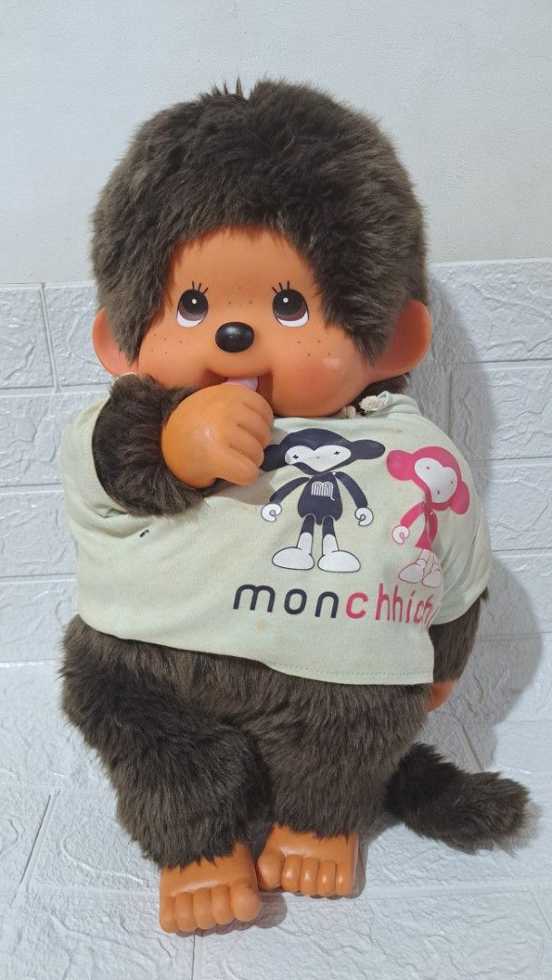 Sekiguchi Monchhichi Plush Doll with Outfit (Category: Plushies & Soft Toys) located in Quezon City. Submitted by hersheejubilo (Listing ID 1469304882, Image 2). Description: -[AUTHENTIC / ORIGINAL] Sekiguchi Monchhichi Premium Standard Jumbo 2L Size Boy with Official Graphic Hoodie Letting go of this highly collectible, massive Jumbo 2L Monchhichi Boy plush doll. This is the premium "baby-sized" variant—extremely chunky, heavy, and incredibly hu