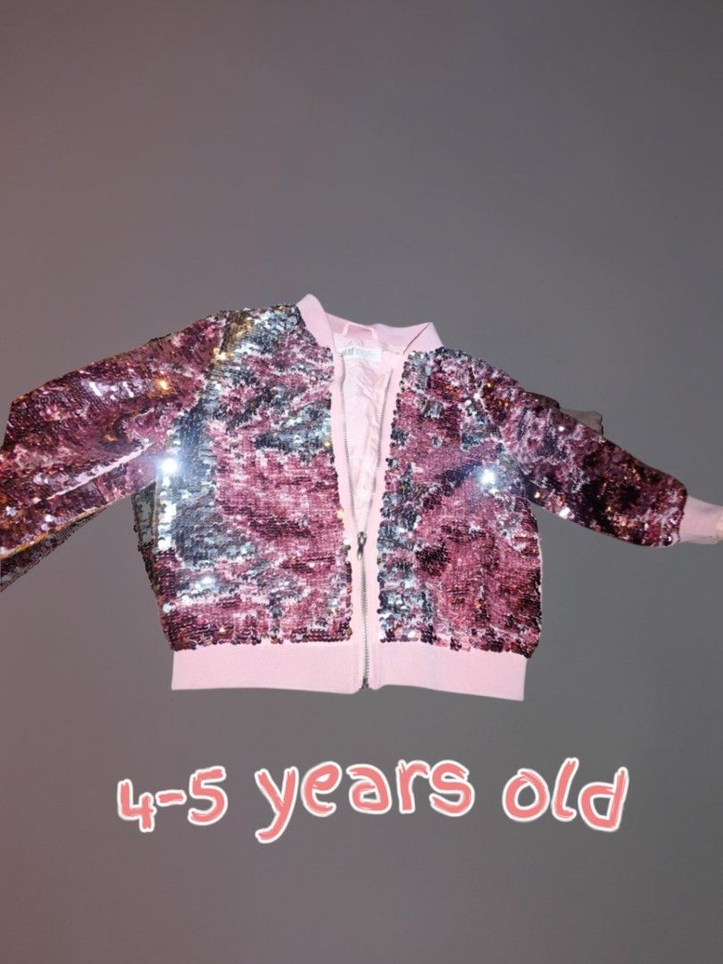 sequined 2 tone color jacket (Category: Babies & Kids Fashion) located in Manila. Submitted by crustynico23 (Listing ID 1469346655, Image 1). Description: selling this 2 tone sequined jacket.
