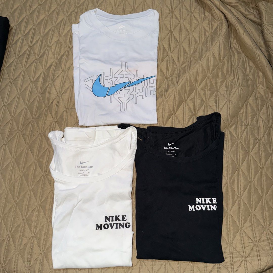 Set of 3 ONLY - Nike Tees (Category: Tshirts & Polo Shirts ) located in Pasig City. Submitted by kingclutter (Listing ID 1469324195, Image 1). Description: Dimes/designs in the pics. All size XL. Black and White - Nike Training Tank Top Blue - With stains, see last two pics..