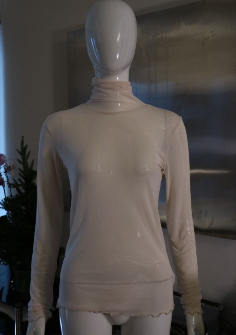 Sheer Mesh Turtleneck Long Sleeve Top Beige (Category: Longsleeves) located in Paranaque City. Submitted by skulkch (Listing ID 1469362257, Image 1). Description: - Color: Classic neutral beige - Style: Sheer mesh turtleneck top with long sleeves - Details: Chic lettuce hem on cuffs and bottom hem - Fit: Stretchy, lightweight, and breathable fabric - Versatility: Great for layering under sweaters or wearing solo.