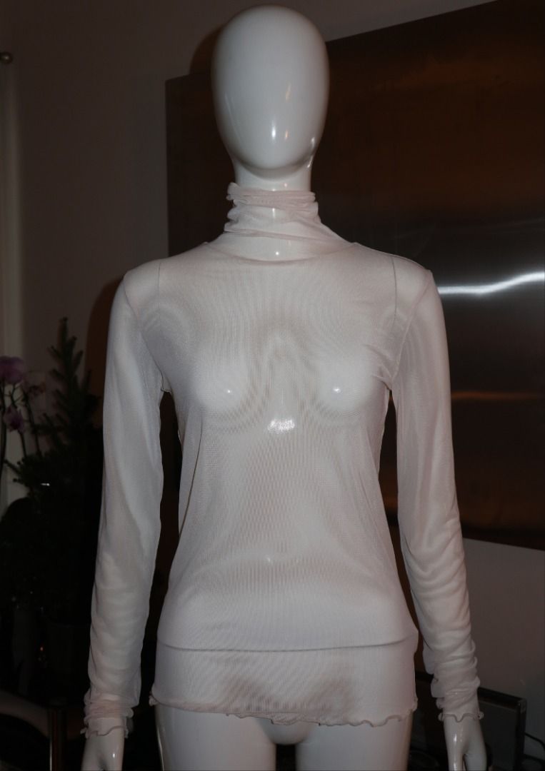 Sheer Mesh Turtleneck Long Sleeve Top Beige (Category: Longsleeves) located in Paranaque City. Submitted by skulkch (Listing ID 1469362257, Image 2). Description: - Color: Classic neutral beige - Style: Sheer mesh turtleneck top with long sleeves - Details: Chic lettuce hem on cuffs and bottom hem - Fit: Stretchy, lightweight, and breathable fabric - Versatility: Great for layering under sweaters or wearing solo.