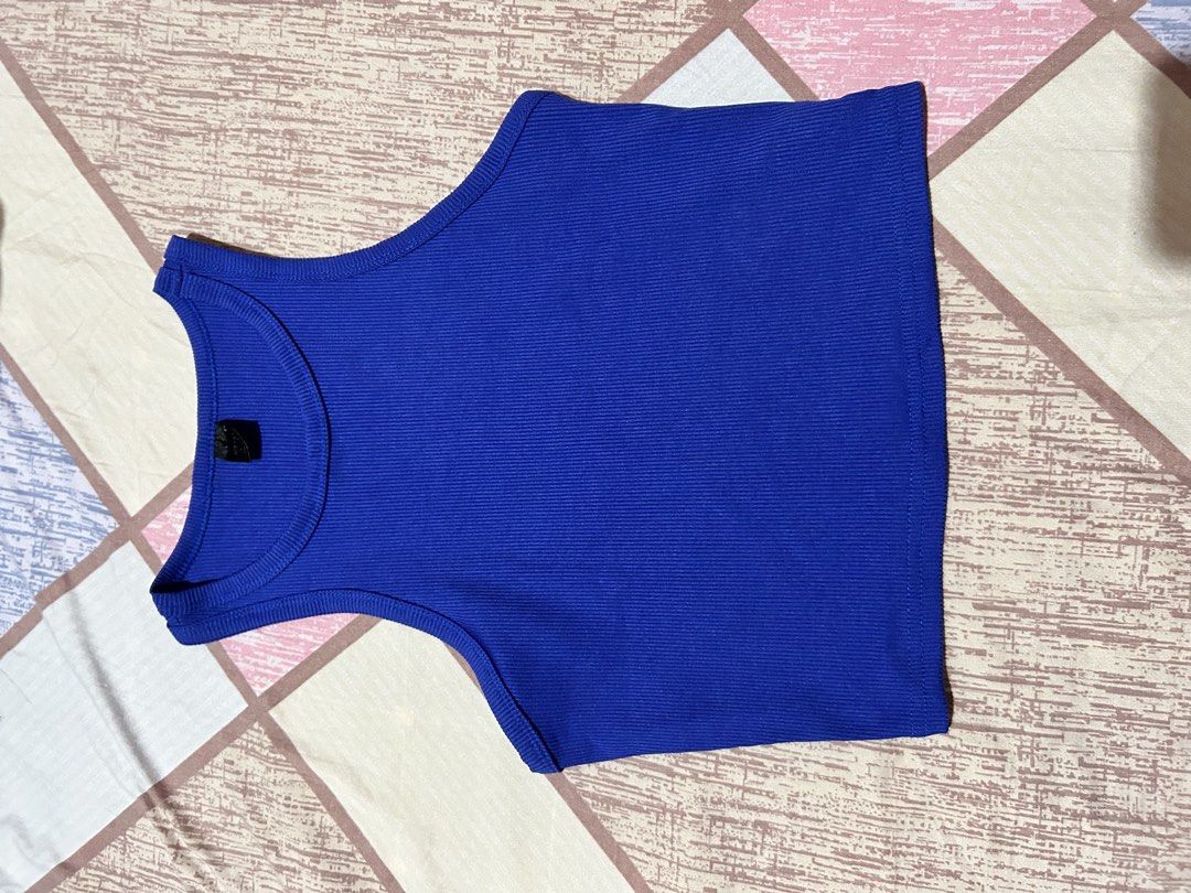 SHEIN Ribbed Crop Top Tank Tops Bundle (Category: Sleeveless) located in Quezon City. Submitted by machristin03081 (Listing ID 1469213715, Image 2). Description: - Brand: SHEIN - Quantity: Bundle of 3 - Colors: Royal blue, beige, and black - Styles: Sleeveless racerback and square neck - Grab the set today!.