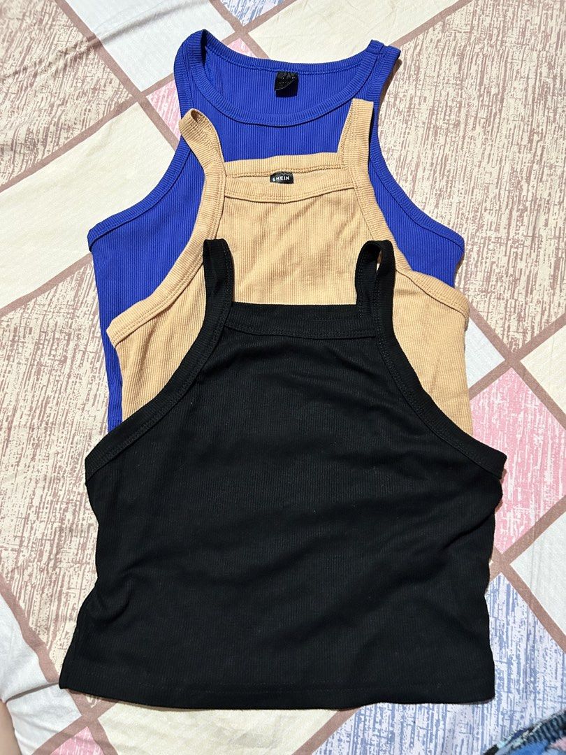 SHEIN Ribbed Crop Top Tank Tops Bundle (Category: Sleeveless) located in Quezon City. Submitted by machristin03081 (Listing ID 1469213715, Image 1). Description: - Brand: SHEIN - Quantity: Bundle of 3 - Colors: Royal blue, beige, and black - Styles: Sleeveless racerback and square neck - Grab the set today!.