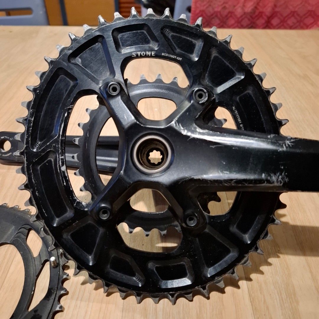 Shimano GRX Crankset with Stone Chainring (Category: Bicycles) located in Calamba. Submitted by 19836n (Listing ID 1469205866, Image 1). Description: - Shimano GRX crankset paired with a Stone 52T chainring - Clearly stamped with BCD110GT-52T markings on the aluminium chainring - Spindle and teeth are intact, ready for gravel or road setup - Includes extra Shimano GRX chainrings with normal wear and scratches - Perfect drivetrain upgrade for your
