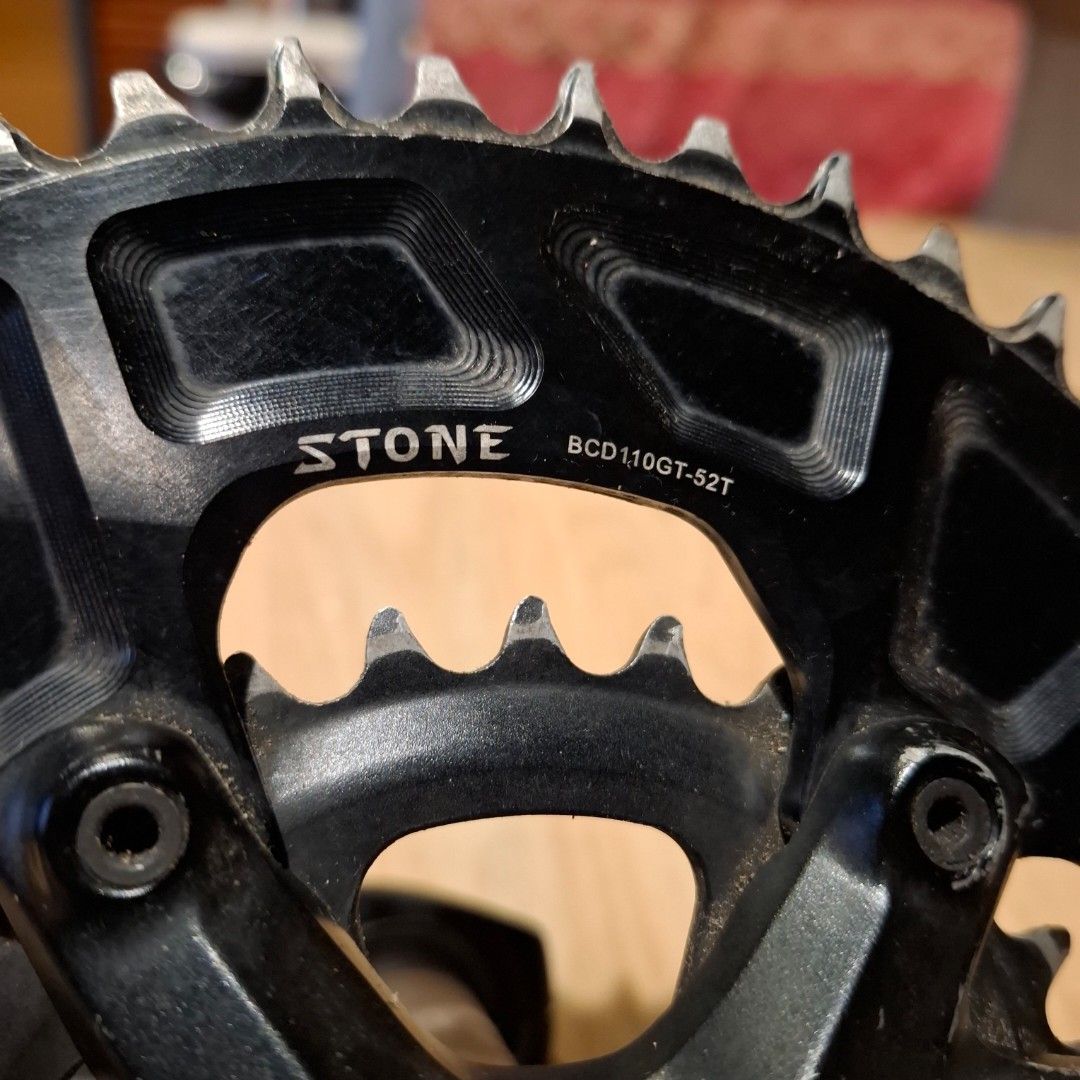 Shimano GRX Crankset with Stone Chainring (Category: Bicycles) located in Calamba. Submitted by 19836n (Listing ID 1469205866, Image 2). Description: - Shimano GRX crankset paired with a Stone 52T chainring - Clearly stamped with BCD110GT-52T markings on the aluminium chainring - Spindle and teeth are intact, ready for gravel or road setup - Includes extra Shimano GRX chainrings with normal wear and scratches - Perfect drivetrain upgrade for your