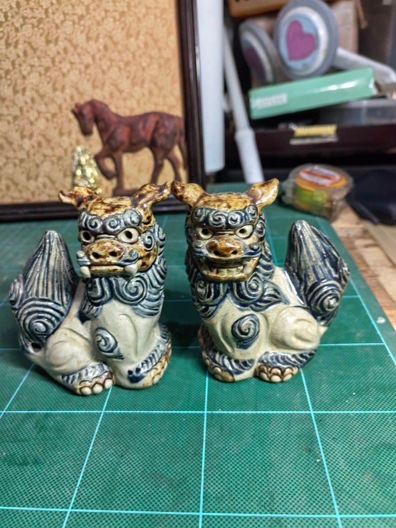 Shisa Lion Foo Dog Pair (Category: Other Home Decor) located in Cebu City. Submitted by dudes_villanueva (Listing ID 1469281142, Image 3). Description: Traditional Ryukyuan Shisa Lion Dog Pair (Okinawan Ceramic Statues) ​Pair of authentic Japanese traditional guardian lions (Shisa), handcrafted from heavy ceramic with classic glazed blue-and-earthy brown detailing over an off-white base. ​Dimensions: Length 3in x Width 2in x Height 4in ​Condition