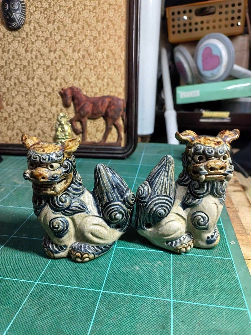 Shisa Lion Foo Dog Pair (Category: Other Home Decor) located in Cebu City. Submitted by dudes_villanueva (Listing ID 1469281142, Image 2). Description: Traditional Ryukyuan Shisa Lion Dog Pair (Okinawan Ceramic Statues) ​Pair of authentic Japanese traditional guardian lions (Shisa), handcrafted from heavy ceramic with classic glazed blue-and-earthy brown detailing over an off-white base. ​Dimensions: Length 3in x Width 2in x Height 4in ​Condition