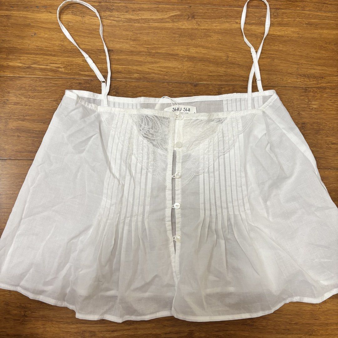 SHUSHI Herra Top (Category: Sleeveless) located in Manila. Submitted by floraltones (Listing ID 1469220201, Image 1). Description: Really pretty and dainty top! - just unboxed but haven’t worn yet - RFS: bought the wrong size .