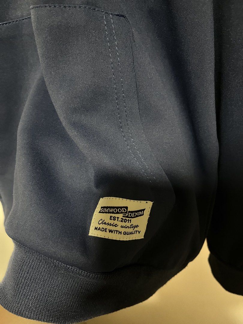 Simwood Denim Navy Blue Hoodie with Drawstrings (Category: Coats, Jackets and Outerwear) located in Paranaque City. Submitted by swiftdragon_cf5b78 (Listing ID 1469333270, Image 2). Description: - Brand: Simwood Denim - Color: Solid navy blue (goes with everything) - Features: Thick ribbed cuffs and hem, white contrast drawstrings, big front pouch pocket - Detail: Woven logo patch on the pocket corner - Comfort: Soft, cozy fabric inside—perfect f