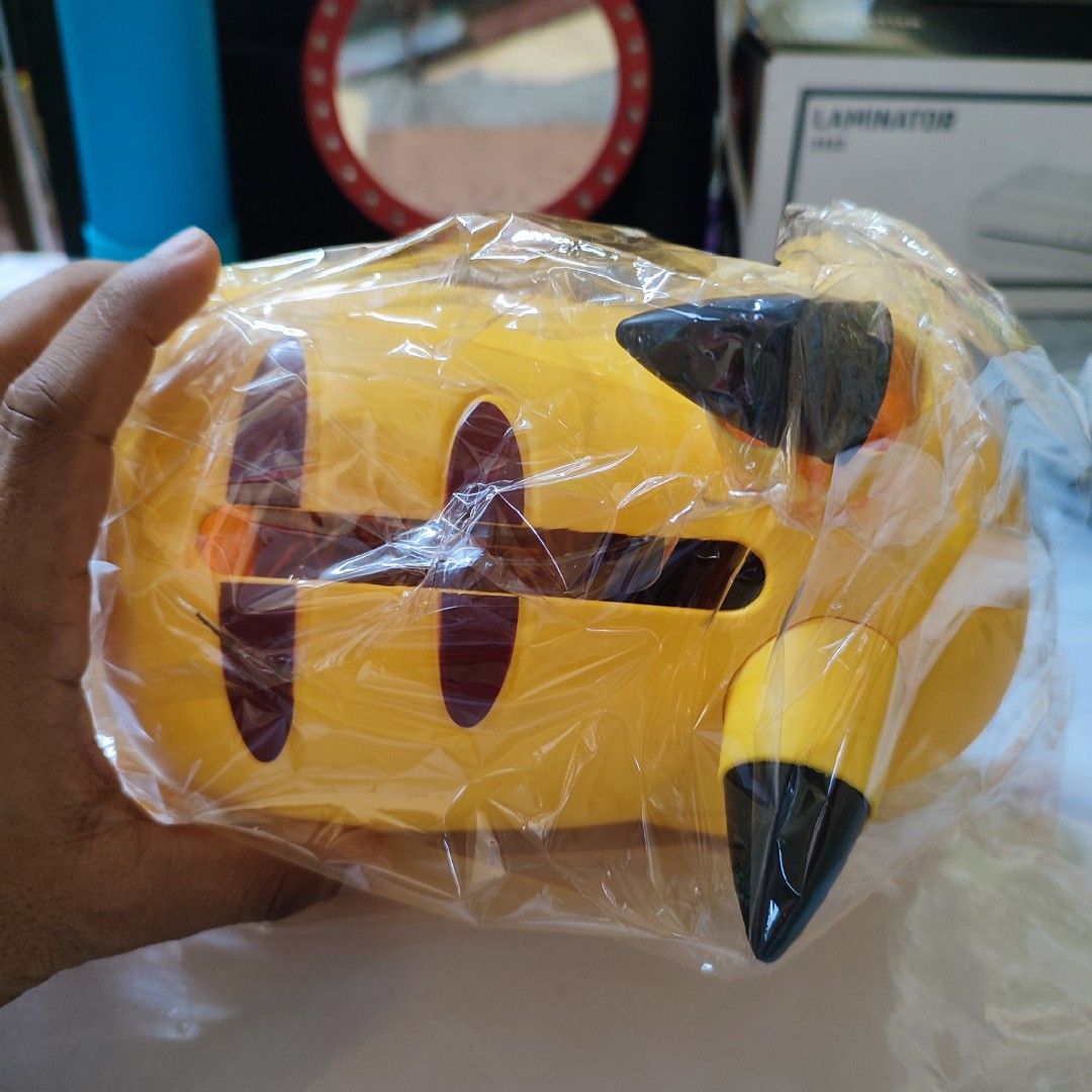 Sleeping Pikachu Tissue Holder Yellow (Category: Designer & Blind Box Toys) located in Manila. Submitted by shop_eyy (Listing ID 1469169472, Image 3). Description: - Design: Adorable sleeping Pikachu face with signature red cheeks and black ear tips - Function: Tissue holder - Condition: Clean surface .