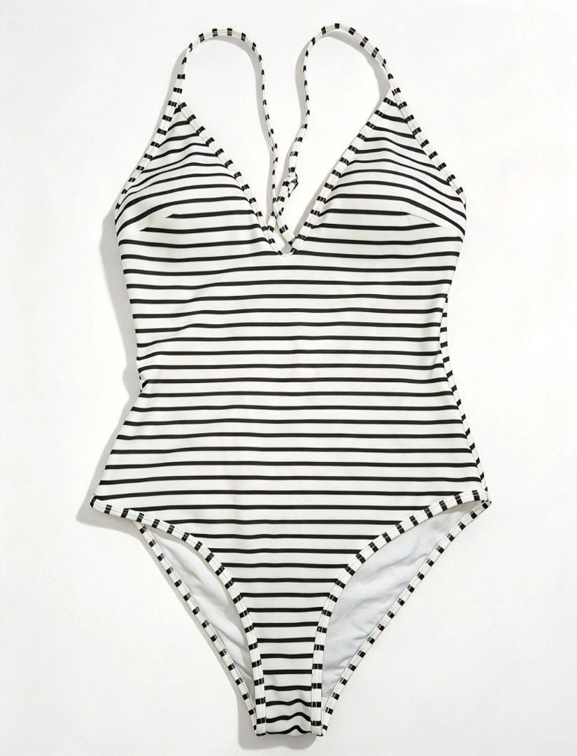 SMALL Cupshe padded striped one-piece swimsuit (Category: Bikinis & Swimsuits) located in Quezon City. Submitted by ana-chan (Listing ID 1469164711, Image 1). Description: Chic black and white striped one-piece swimsuit featuring a flattering V-neck, adjustable criss-cross back straps, and removable padding. Perfect for your next beach getaway!.
